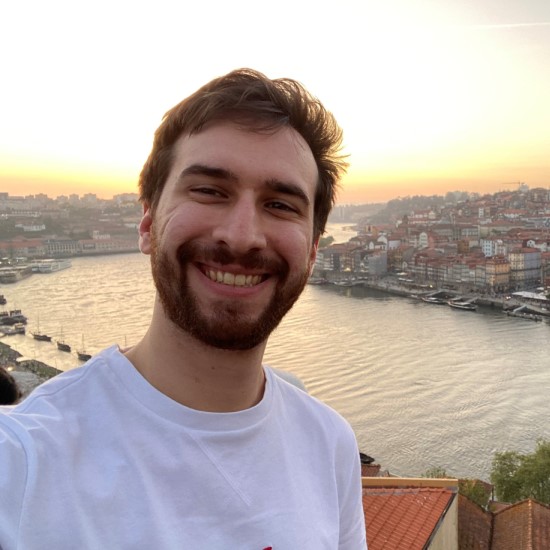Dan smiling and looking into the camera