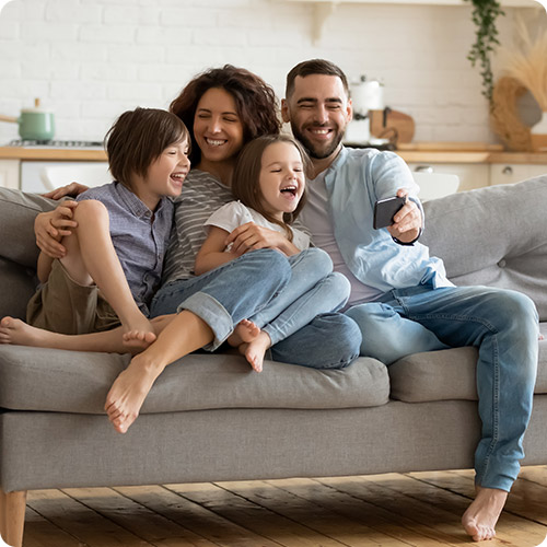 family-on-sofa-white-500x500
