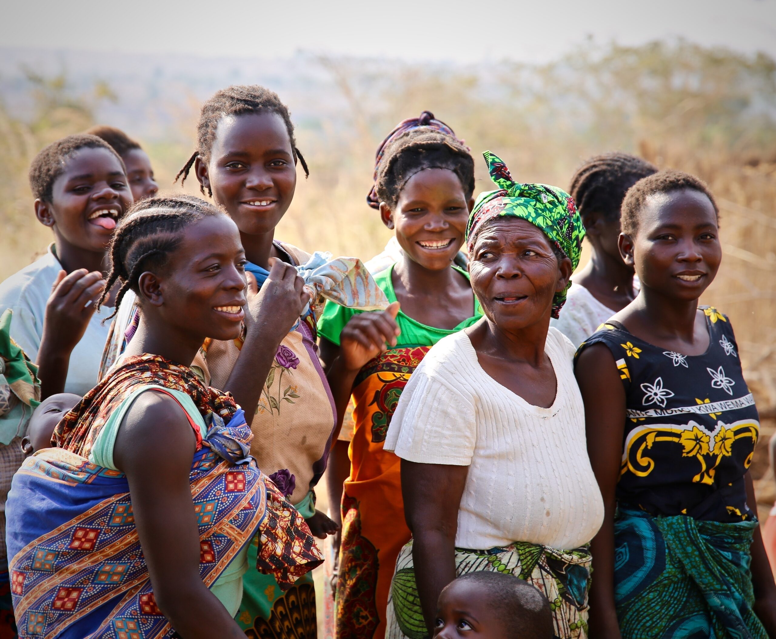Malawi,,Africa,A,Group,Of,Colorfully,Dressed,Happy,Healthy,Smiling